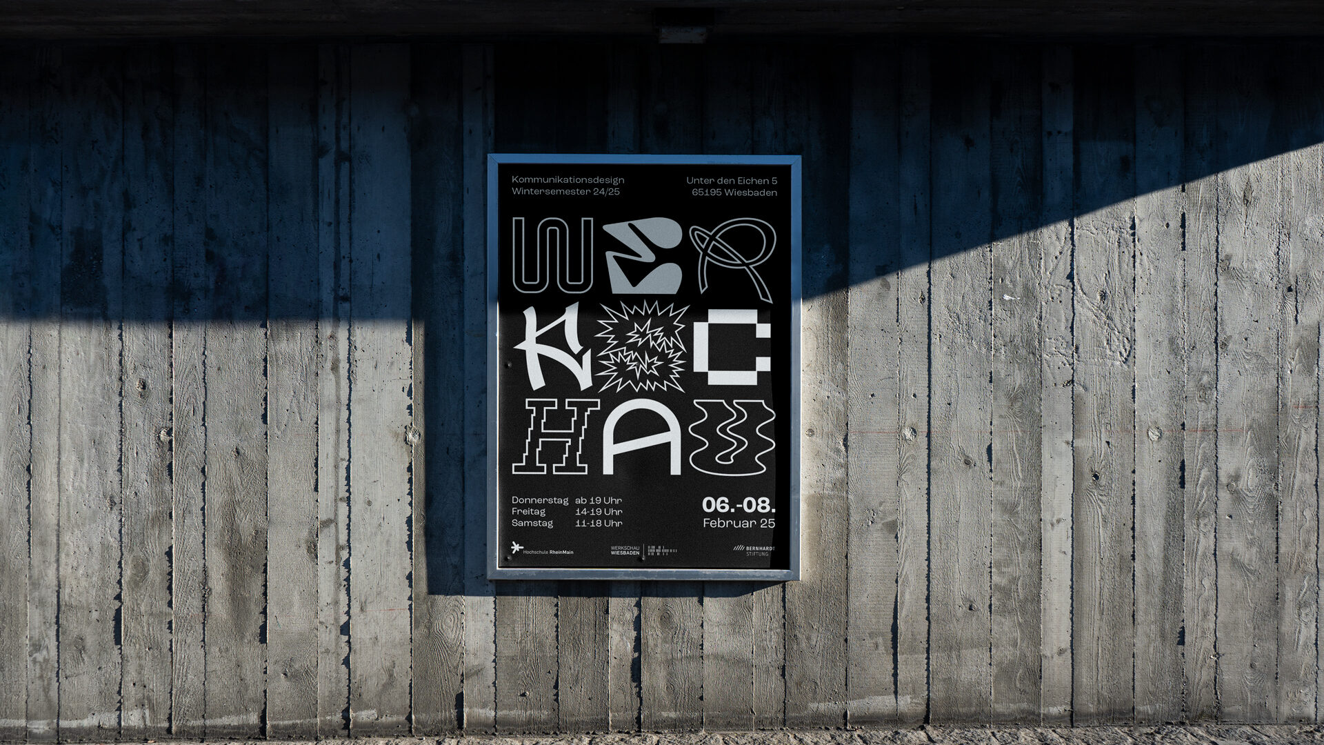 A Werkschau poster is hanging on a wall